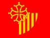 The modern flag of the Languedoc-roussillon, combining the Cross of Toulouse and a quarter of the Arms of Aragon.